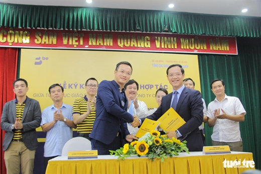 Tổng cục Giáo dục nghề nghiệp, Bộ Lao động - thương binh và xã hội ký kết hợp tác trong lĩnh vực giáo dục nghề nghiệp và đánh giá, công nhận kỹ năng nghề tài xế công nghệ - Ảnh: HÀ THANH